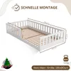 A white wooden children's bed with safety rails, shown with dimensions and assembly information. Produktbild-Vorschau