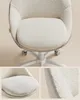 Close-up views of a fluffy, white office chair, highlighting its texture and cushioning. Produktbild-Vorschau