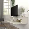 A modern living room with a wall-mounted TV stand. Produktbild-Vorschau