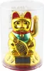 A golden Maneki-neko (waving cat) figurine with a solar panel on its base, enclosed in a clear plastic cylinder. Produktbild-Vorschau