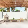 An outdoor patio area with furniture and a retractable side awning. Produktbild-Vorschau