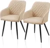 Two beige upholstered dining chairs with black legs are shown against a white background. Produktbild-Vorschau