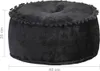 A dark gray round pouf with pom-pom trim is shown against a white background. Dimensions are indicated by measurement lines and text. Podgląd zdjęcia produktu
