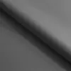 A close-up view of a folded gray fabric, likely a bedspread or blanket, with soft lighting creating shadows. Produktbild-Vorschau