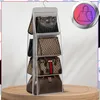 A hanging organizer with multiple compartments filled with handbags. Produktbild-Vorschau
