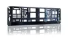 A black license plate holder is shown against a white background. Produktbild-Vorschau