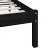 Close-up view of the corner of a black wooden bed frame, showing the leg and slats. Produktbild-Vorschau