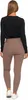 A woman wearing black long-sleeved top and brown leggings, viewed from the back. Produktbild-Vorschau
