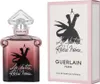 A bottle of Guerlain La Petite Robe Noire Intense Eau de Parfum for women and its packaging are displayed side-by-side against a white background. Voir les images du produit