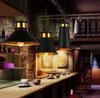 A bar or restaurant interior with pendant lights and coffee cups on the counter. Náhled obrázku produktu