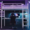 A loft bed with a desk and shelves underneath, set up in a gaming room with RGB lighting. Náhľad obrázku produktu