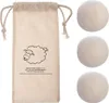 A set of wool dryer balls and a storage bag are displayed against a white background. Produktbild-Vorschau