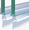 Two shower door seals attached to glass panels. Produktbild-Vorschau