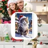 A collage of Christmas-themed images, including a family, a desk setup, a cat advent calendar, and festive decorations. Produktbild-Vorschau