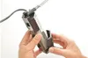 Hands holding a black aquarium filter accessory against a white background. Produktbild-Vorschau