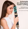 A woman is using a hair styling tool to curl her hair. Produktbild-Vorschau