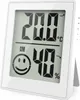 A digital thermometer and hygrometer displaying temperature and humidity readings, along with a smiley face comfort indicator. Produktbild-Vorschau
