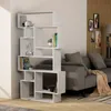 A modern living room with a gray sofa and a white bookshelf. Produktbild-Vorschau
