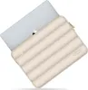 A laptop and its protective sleeve are shown against a white background. Produktbild-Vorschau
