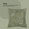 A green cushion with dimensions indicated by white lines and text. Produktbild-Vorschau