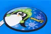 A close-up of a blue sled with a cartoon penguin and snowflakes design. Anteprima dell’immagine prodotto