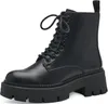 A black lace-up boot with a thick platform sole is shown against a white background. Náhľad obrázku produktu