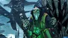 An elderly, wizened character in green robes holds a glowing orb and a book, with a large, intricate structure behind him. Produktbild-Vorschau