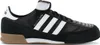 A side view of a black Adidas Mundial Goal sneaker with white stripes and accents. Anteprima dell’immagine prodotto