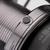 Close-up of a fishing reel handle and spool. Produktbild-Vorschau