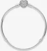 A silver bracelet with a heart-shaped charm. Anteprima dell’immagine prodotto