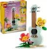 The image shows the packaging of a LEGO Creator Tropical Ukulele set, with a built ukulele and flowers displayed on the box. A separate image of the built ukulele with flowers is also present. Anteprima dell’immagine prodotto