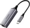 A Ugreen USB-C to Ethernet adapter is shown against a white background. Voir les images du produit