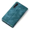 A teal-colored flip case for a smartphone, shown from a diagonal top-down view against a white background. Produktbild-Vorschau