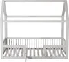 A white wooden house-shaped bed frame with a slatted base and railings. Anteprima dell’immagine prodotto