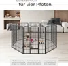 A puppy in a playpen in a modern living room setting. Produktbild-Vorschau