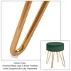 A close-up of golden metal legs of a stool and a small inset image of a green velvet stool with golden legs. Produktbild-Vorschau