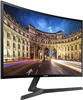 A curved Samsung monitor displaying a cityscape at night. Produktbild-Vorschau