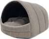 A pet bed shaped like a dome with a soft interior. Produktbild-Vorschau