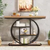 A console table with a circular shelf unit is displayed in a room setting, decorated with books, a shell, and an hourglass. Voir les images du produit