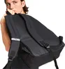 A person wearing a black backpack. Voir les images du produit