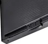 A close-up view of a black electronic device, showing a textured surface and a small panel with buttons and ports. Náhľad obrázku produktu