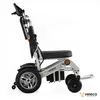 Side view of an electric wheelchair on a white background. Produktbild-Vorschau