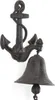 A cast iron anchor-shaped door bell mounted on a white background. Podgląd zdjęcia produktu
