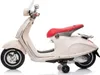 A white electric scooter for children with a red seat, shown from the side against a white background. Podgląd zdjęcia produktu