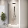 A modern bathroom shower area with a glass shower wall and black shower fixtures. Anteprima dell’immagine prodotto