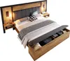 A modern wooden bed with a fabric headboard and integrated nightstands. Voir les images du produit