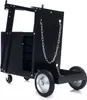 A black metal welding cart with wheels and chains is shown against a white background. Produktbild-Vorschau