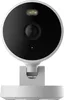 A white security camera with a black faceplate is shown from the front, mounted on a white stand. Anteprima dell’immagine prodotto