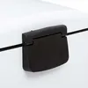 A close-up shot of a black hinge on a white trash can lid. Anteprima dell’immagine prodotto