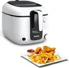 A white Tefal deep fryer is shown next to a plate of french fries and chicken nuggets with a small bowl of ketchup. Produktbild-Vorschau